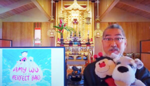 video still of Rev. Kerry Kiyohara telling a children's story for a remote audience