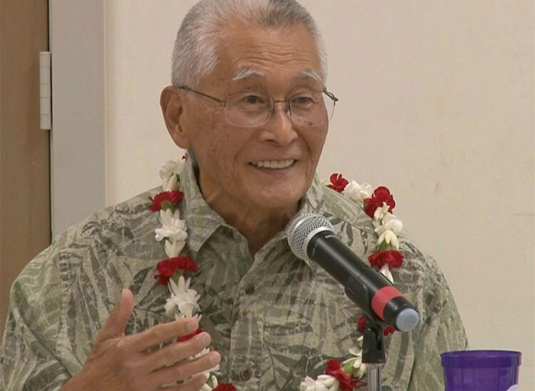 Rev. Dr. Kenji Akahoshi gestures at BSC Summer Session 2024