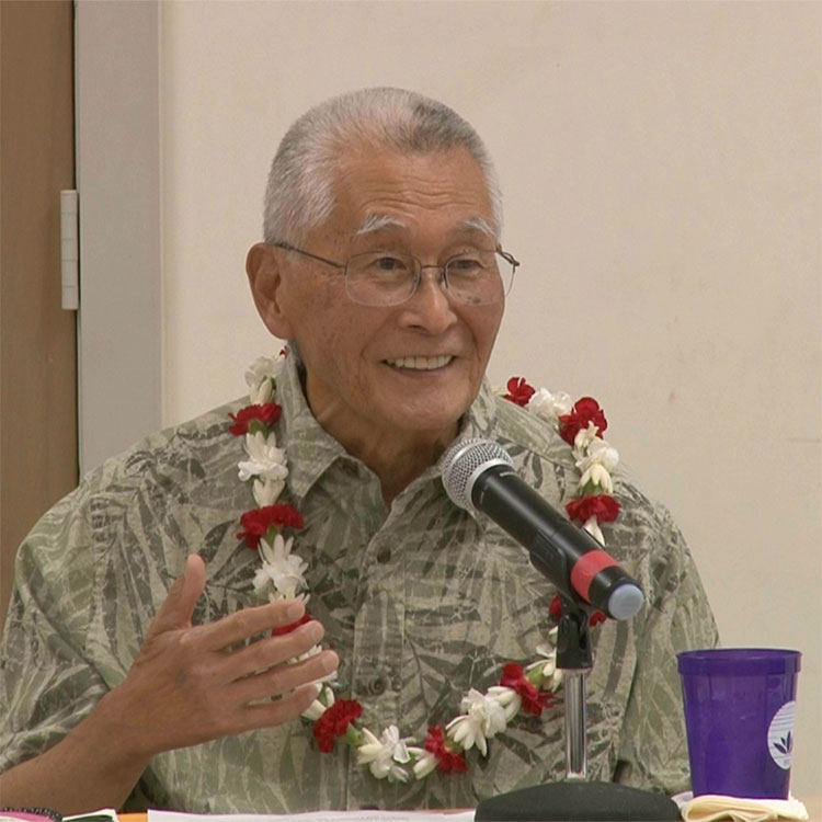 Rev. Dr. Kenji Akahoshi gestures at BSC Summer Session 2024